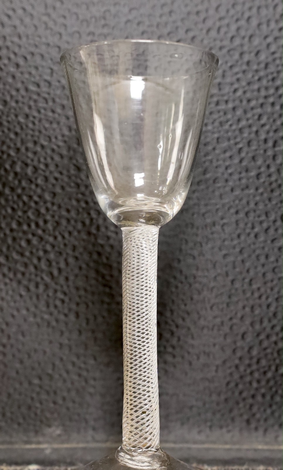An 18th century air twist cordial glass and a plain stem cordial glass, tallest 16cm